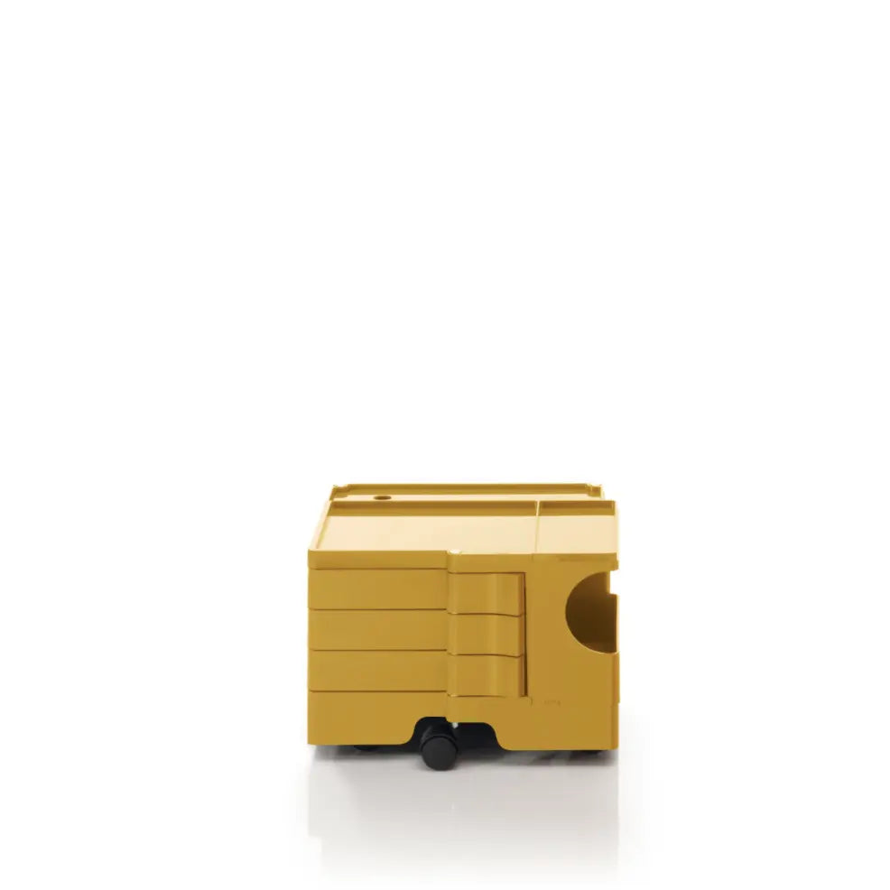 The Boby Trolley Extra Small with 3 drawers, seen here In the colour honey. Available exclusively at Bob and Friends.